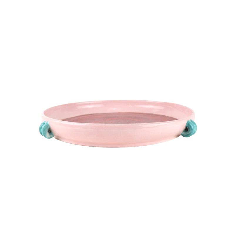 Pastel Pink glazed dish with blue handles handmade by Arianna de Luca, available at www.cuemars.com