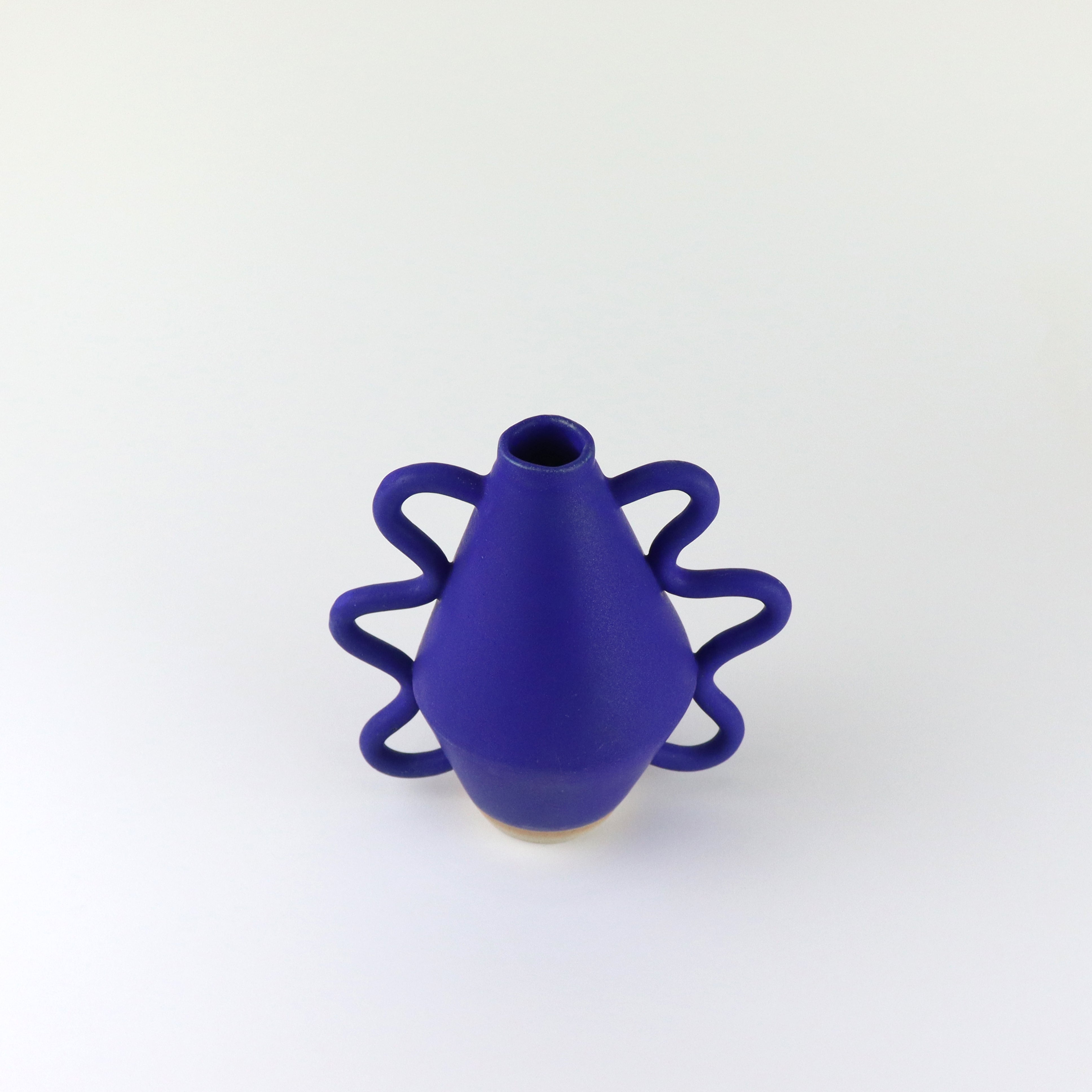 Blue Vase with wiggle arms hand thrown by Bristolian Sophie Alda. Available at www.cuemars.com