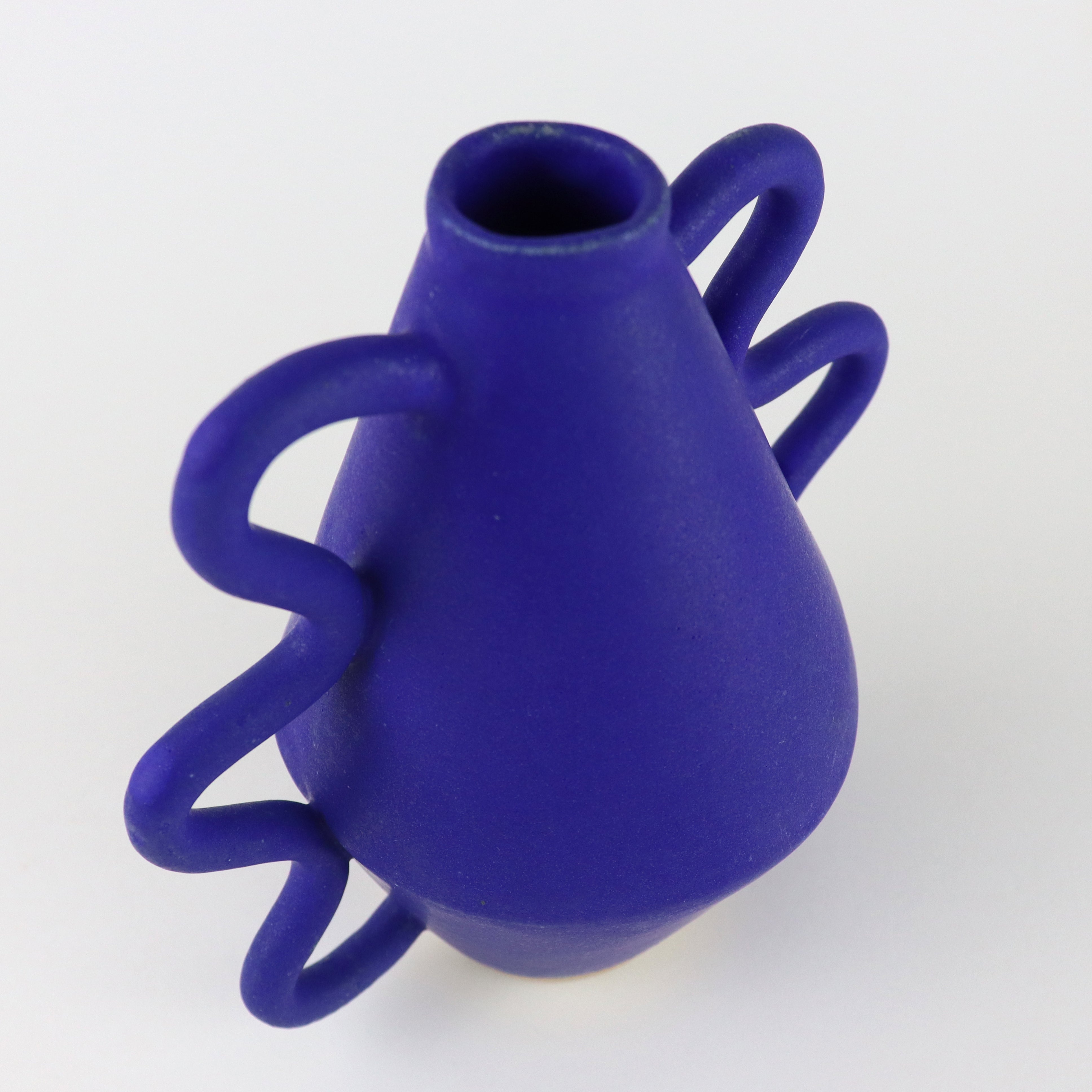 Blue Vase with wiggle arms hand thrown by Bristolian Sophie Alda. Available at www.cuemars.com