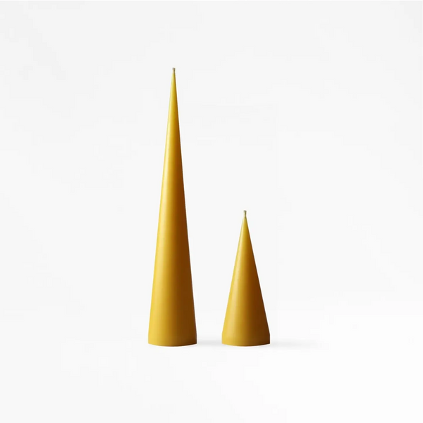 Two cone beeswax pillar candles by Bzzwax, available at www.cuemars.com