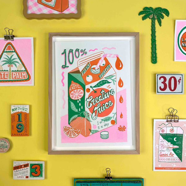 a green, pink and orange orange juice carton with the typography 100% Freshly Squeezed Creative Juice - 1 of your 5 a day by British illustrator Jacqueline Colley