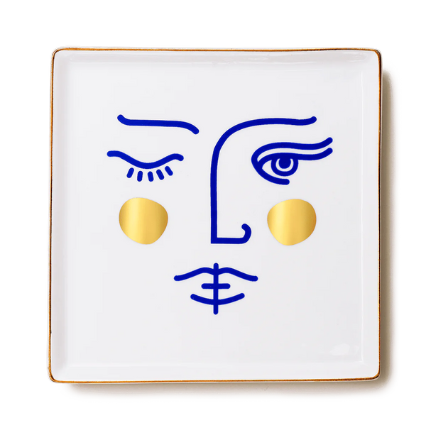 Godess Janus printed on a ceramic tray in a mediterranean blu and gold, designed by Octaevo in Barcelona, sold by www.cuemars.com in London