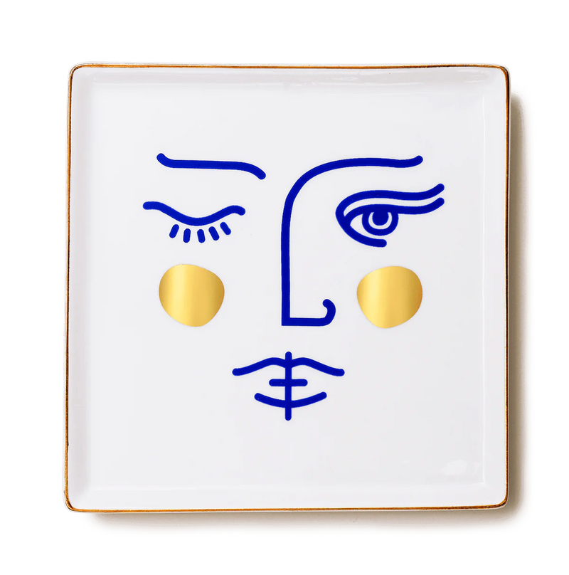 Godess Janus printed on a ceramic tray in a mediterranean blu and gold, designed by Octaevo in Barcelona, sold by www.cuemars.com in London