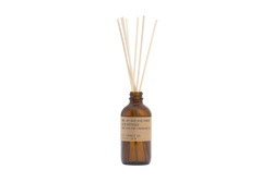 reed diffuser in amber glass number 36 by pf candle co, available at www.cuemars.com
