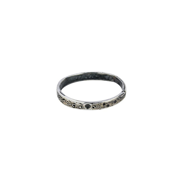 moon crater ring handmade in oxidised silver by London based jewellery designer Momocreatura. Available at www.cuemar.com