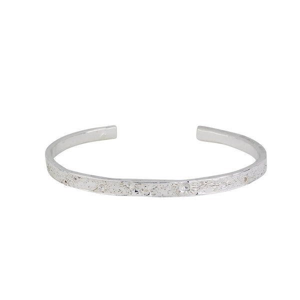 Shiny Silver moon bangle featuring the moon craters that have been individually marked by hand by independent maker Momocreatura