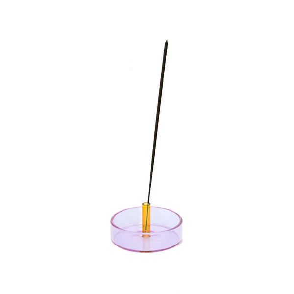 Lilac and Peach glass incense holder with an incense stick on it by British brand Block Design, available at www.cuemars.com