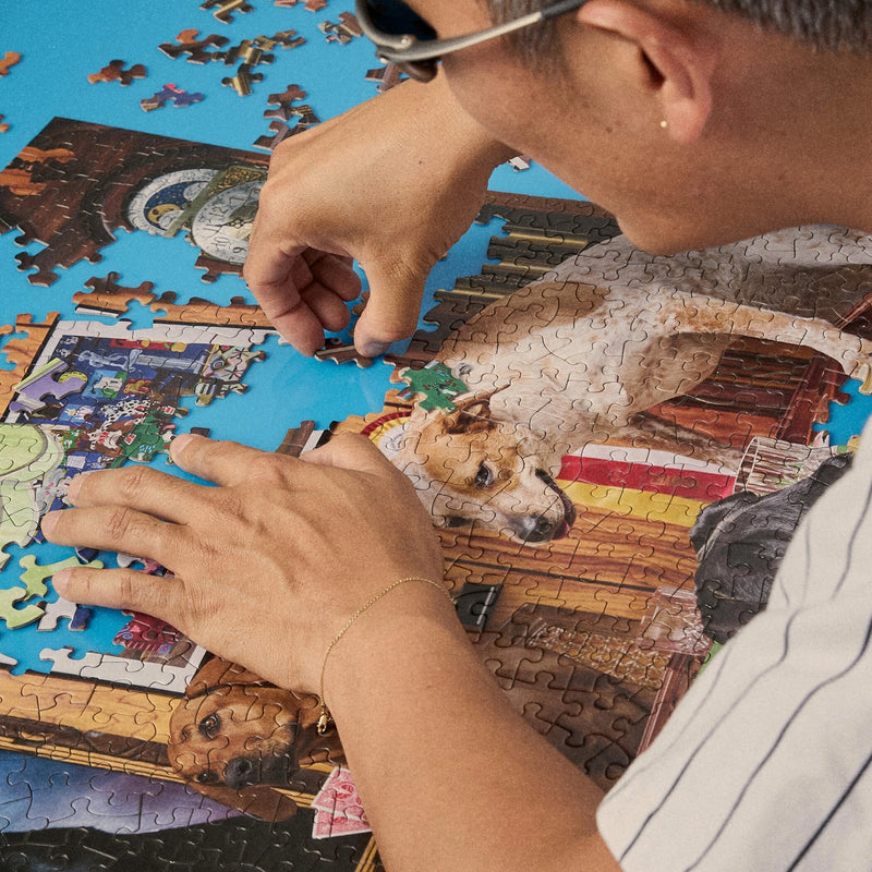 Le Puzz 1000-piece jigsaw puzzle featuring playful dog illustrations in vibrant colors – fun, collectible puzzle for dog lovers.