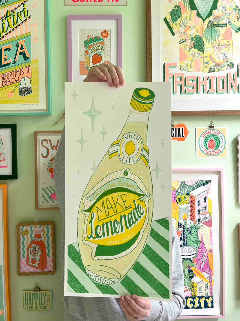 Colourful yellow and green silk screen print with the typography Make Lemonade, by Londoner Jacqueline Colley. Available at www.cuemars.com