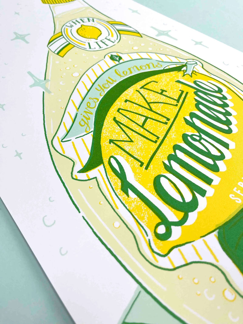 Colourful yellow and green silk screen print with the typography Make Lemonade, by Londoner Jacqueline Colley. Available at www.cuemars.com