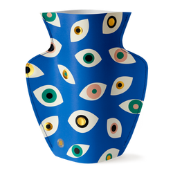 Colourful paper vase filled with Nazar eyes in blue, pink, green and gold. Designed by Spanish brand Octaevo, available at www.cuemars.com