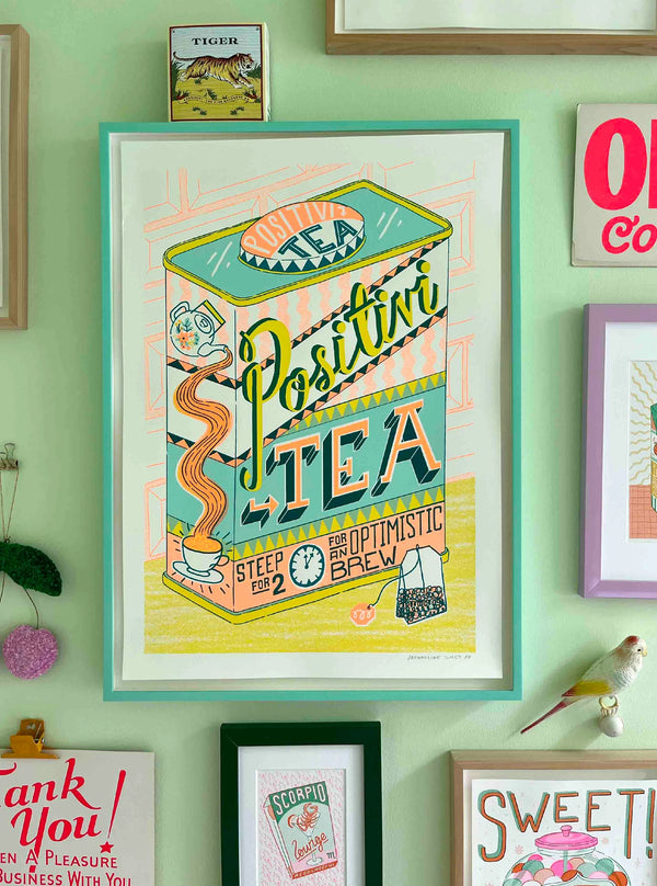 Colourful Positivity tea colourful silk screen print in orange and green, by Londoner Jacqueline Colley. Available at www.cuemars.com