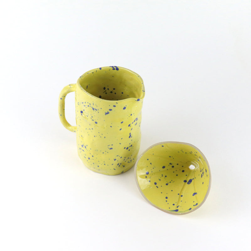 Ceramic coffee drip in yellow and blue speckles, designed in collaboration with Cuemars. Handmade in Warsaw by Siup Studio.