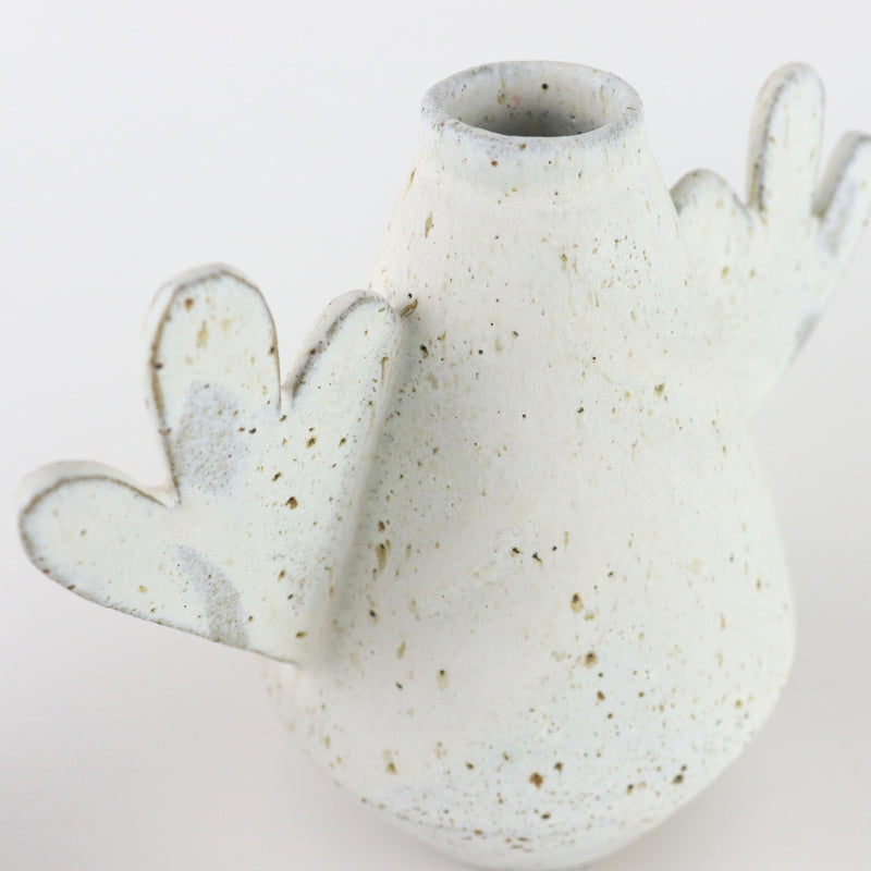 Diamond shape ceramic vase in heavy speckled with flower shaped arms, handmade by Sophie Alda, available at www.cuemars.com