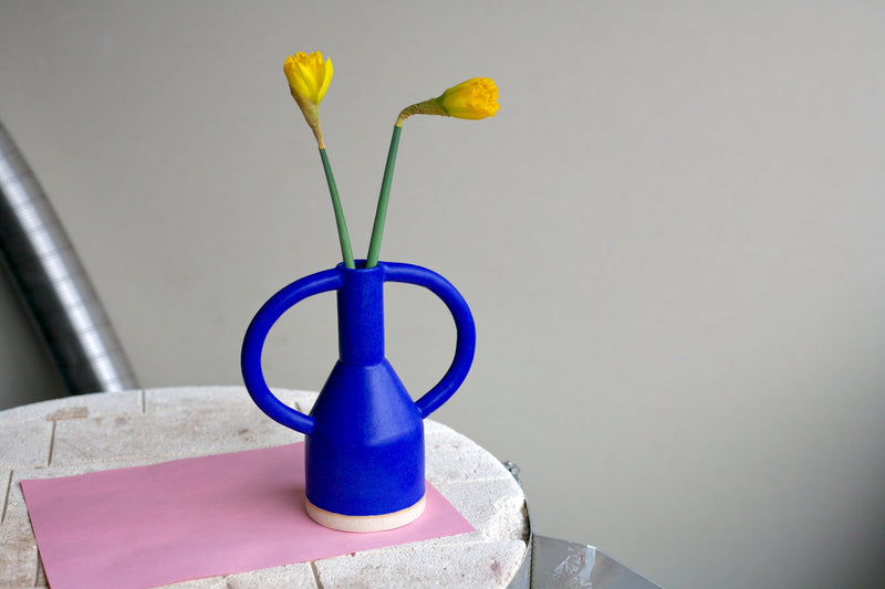blue ceramic vase with 2 big eared handles handmade in London by ceramicist Sophie Alda, available at cuemars.com
