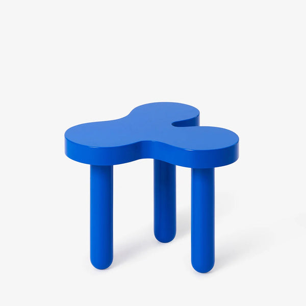 Bright Blue side table with a very organic design by Areaware and Sophie Colle, available at www.cuemars.com