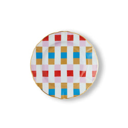 Round porcelain dessert plate from Bitossi Home's Abracadabra collection, featuring a vivid geometric design with multicolored starburst and pinwheel motifs, accented with gold detailing for a magical, eye-catching finish