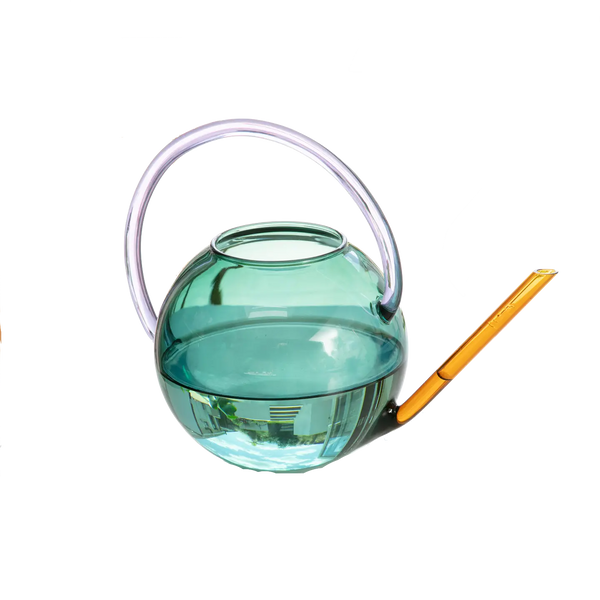 Colourful glass watering can by British homeware brand Block Design, available at www.cuemars.com