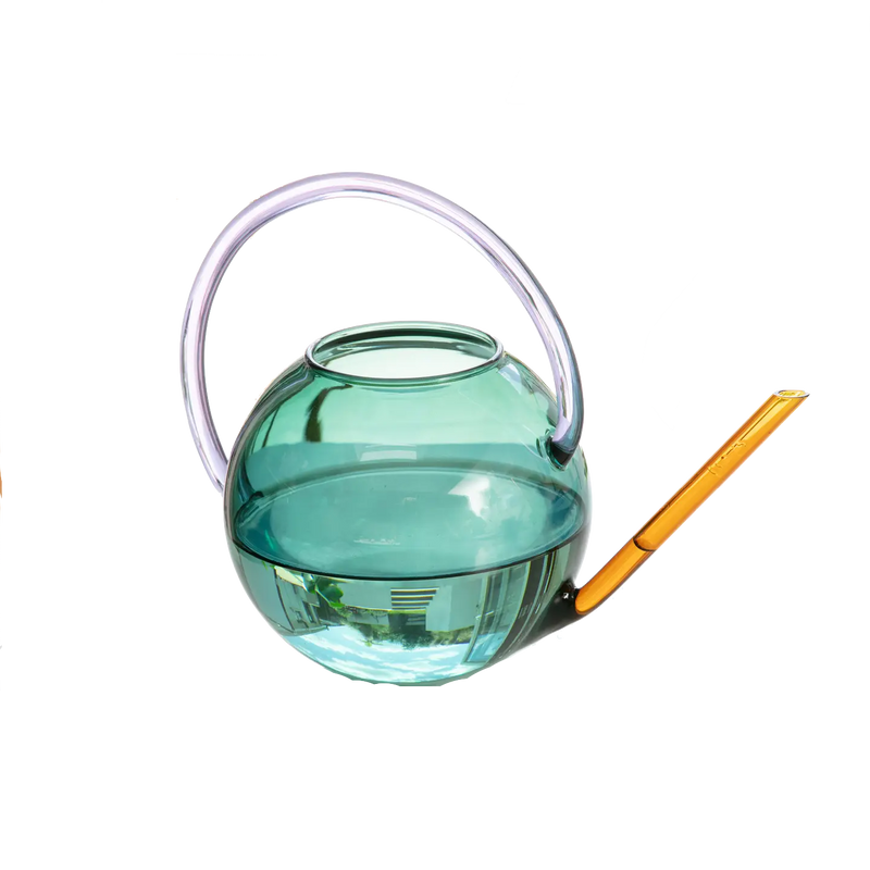 Colourful glass watering can by British homeware brand Block Design, available at www.cuemars.com