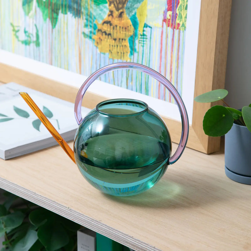 Colourful glass watering can by British homeware brand Block Design, available at www.cuemars.com