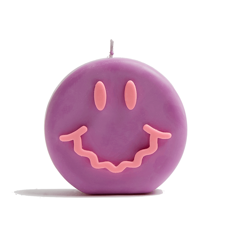 Purple and pink smiley soy wax candle with a wavy smile, by UK based independent brand Wavey Casa, available at www.cuemars.com