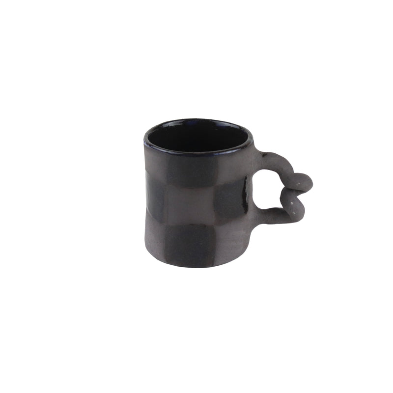 Black Clay mug with glazed and unglazed squares and a twisted handle, handmade by Harlie Brown Studios, available at www.cuemars.com