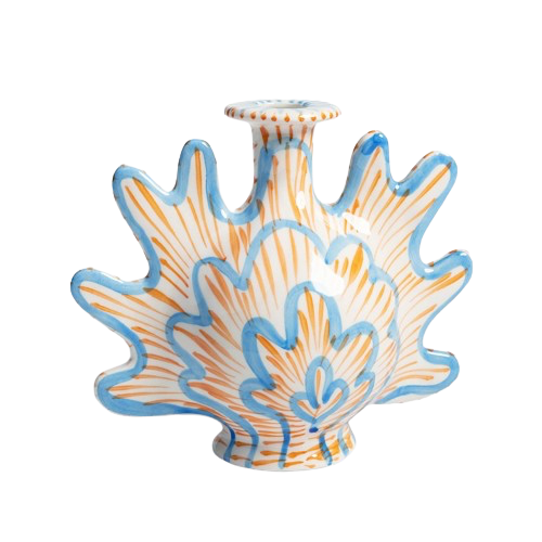 Ceramic blue and orange candle holder in the shape of a shell, by Klevering. Available at www.cuemars.com