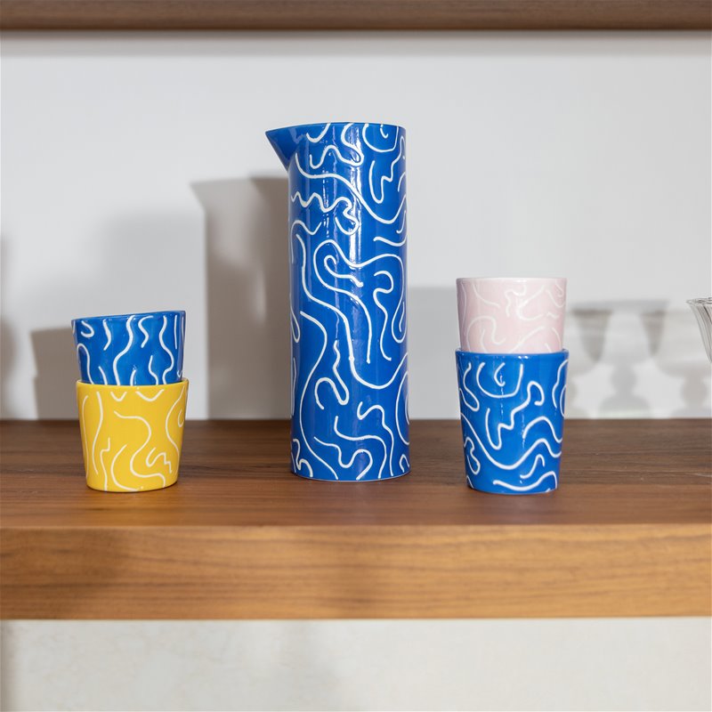 Porcelain water jug in blue with white doodling, available at www.cuemars.com