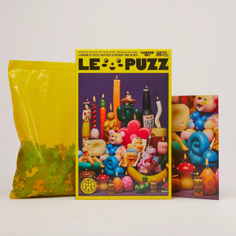Lepuzz Lighten Up puzzle box featuring a colourful design with vintage candle characters
