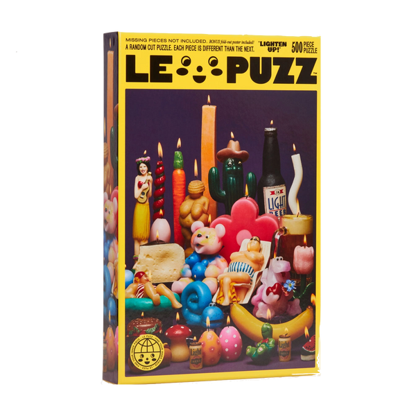 Lepuzz Lighten Up puzzle box featuring a colourful design with vintage candle characters
