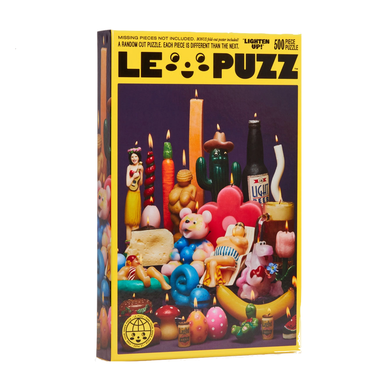 Lepuzz Lighten Up puzzle box featuring a colourful design with vintage candle characters