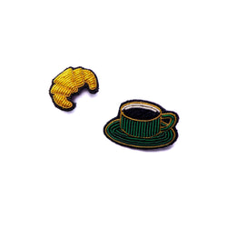 French croissant and black coffee in a green mug brooch designed in France by Macon and Lesquoy, ethically made in Pakistan by hand. Available at www.cuemars.com