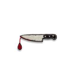 Knife with a drop of blood brooch designed in France by Macon and Lesquoy, ethically made in Pakistan by hand. Available at www.cuemars.com