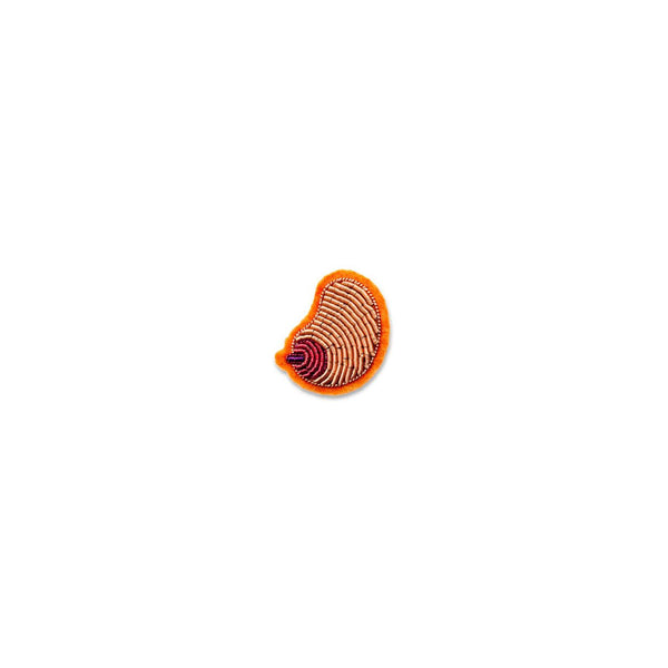 Perky boob brooch designed in France by Macon and Lesquoy, ethically made in Pakistan by hand. Available at www.cuemars.com