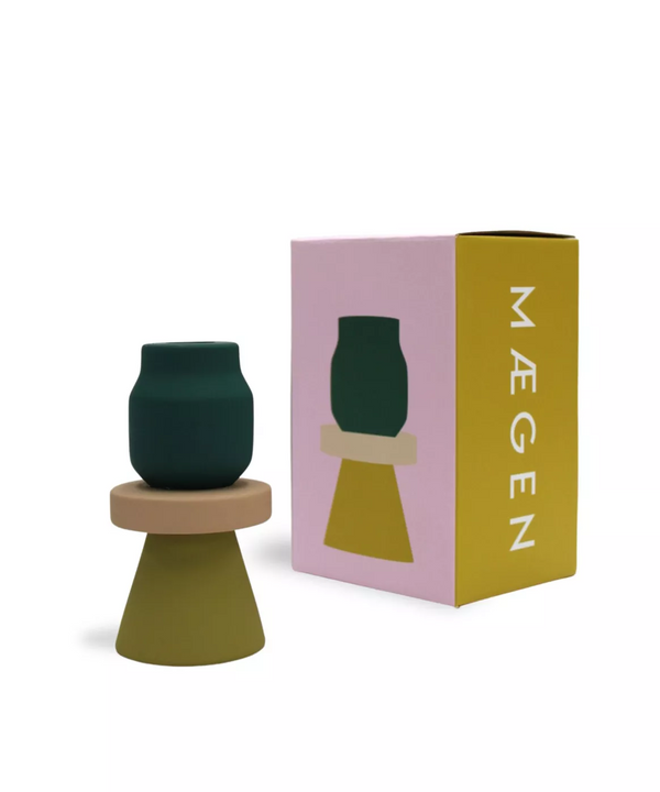 green and beige ceramic candle holders by Maegen, available at www.cuemars.com