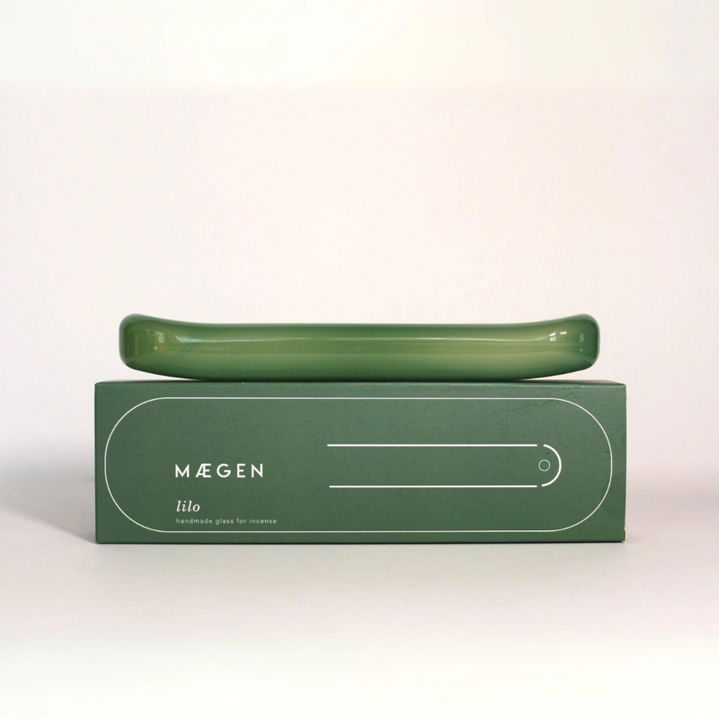 sea green handmade glass incense holder by British brand Maegen, inspired by an inflatable lily, available at www.cuemars.com