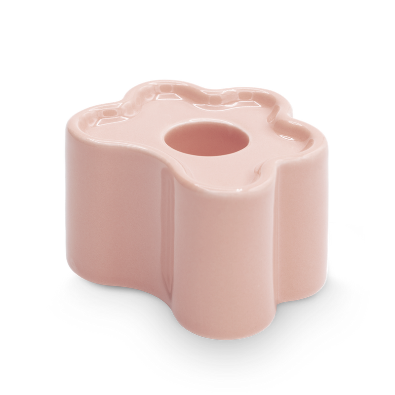 Pink candle holder designed by Spanish brand Octaevo, inspired by flower petals and stackable. Available at www.cuemars.com