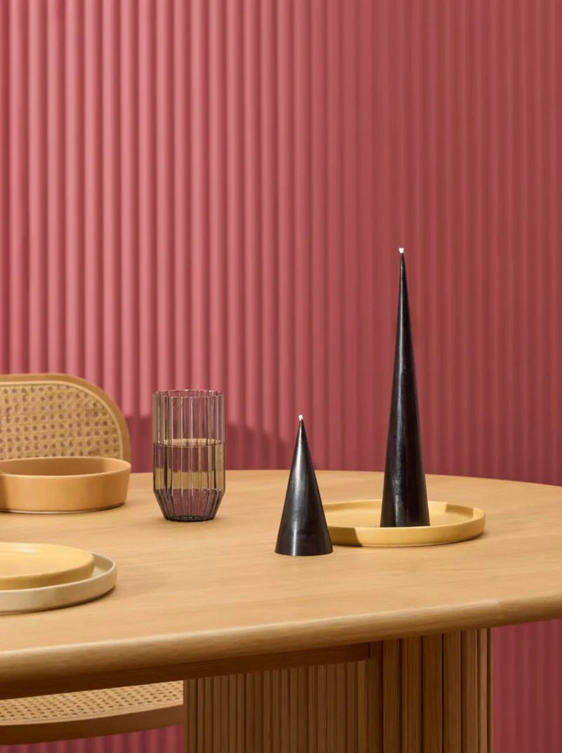 Two cone beeswax pillar candles by Bzzwax, available at www.cuemars.com