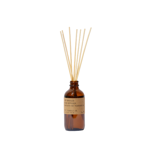 Los Angeles Reed rattan reed diffuser in an amber glass jar by PF Candle Co, available at cuemars.com
