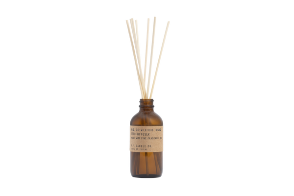 reed diffuser in amber glass number 36 by pf candle co, available at www.cuemars.com