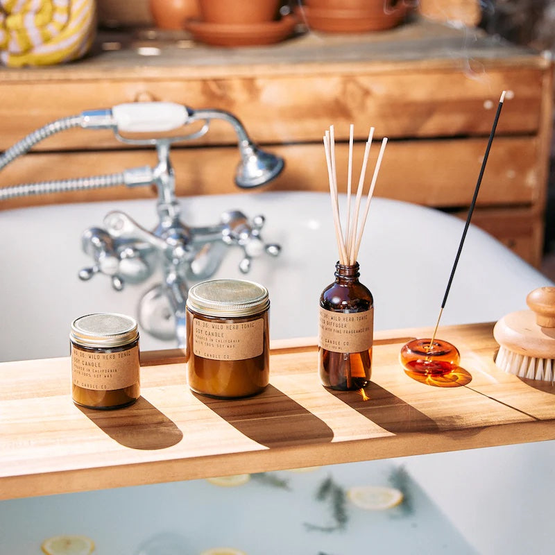 reed diffuser in amber glass number 36 by pf candle co, available at www.cuemars.com