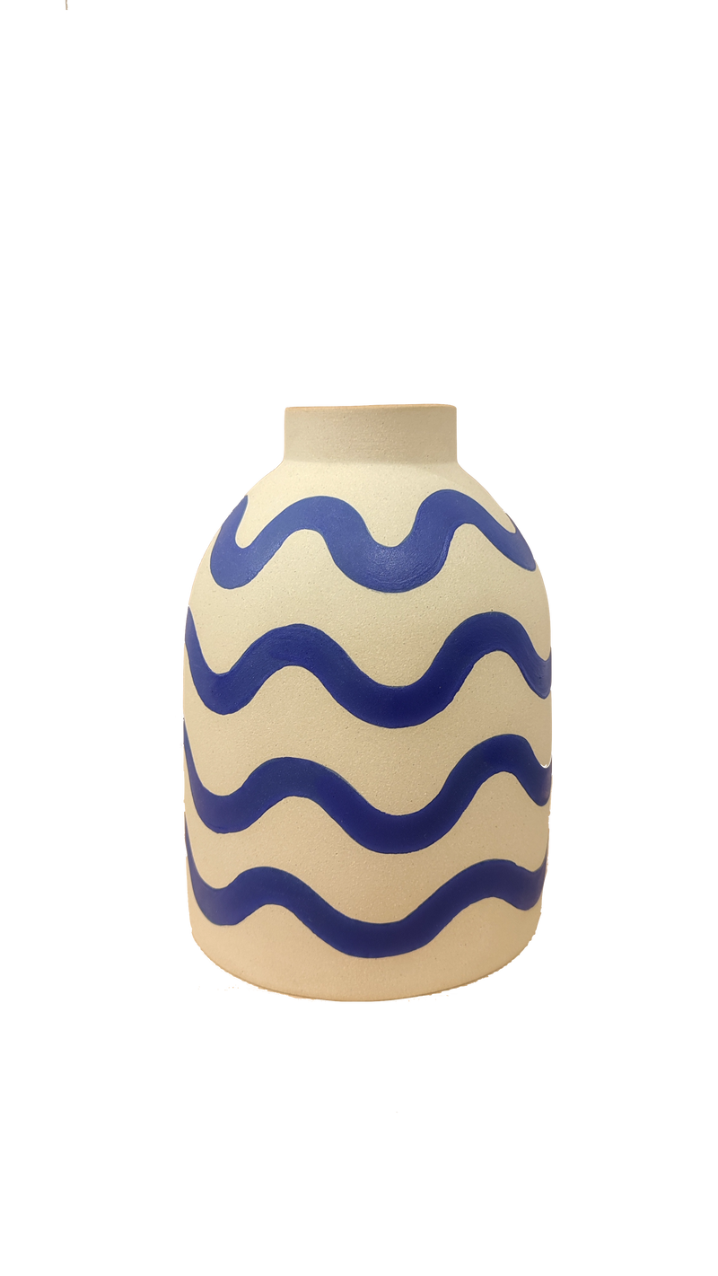 handmade porcelain blue wave beehive vase by ceramicist Sophie Alda making this handmade piece a unique staple for home. Available at cuemars.com