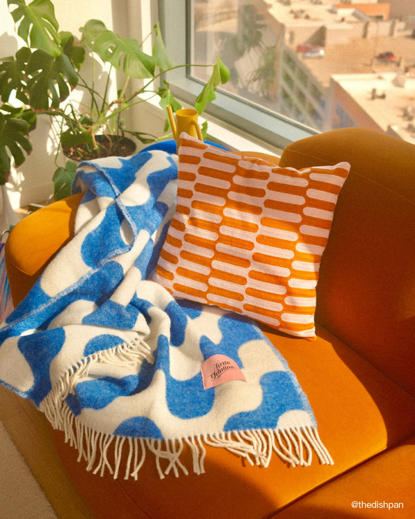 Ziggy Cushion by Tarta Gelatina – 45 × 45 cm hand-embroidered organic cotton cushion cover in wavy orange & pink pattern, sustainable artisan design