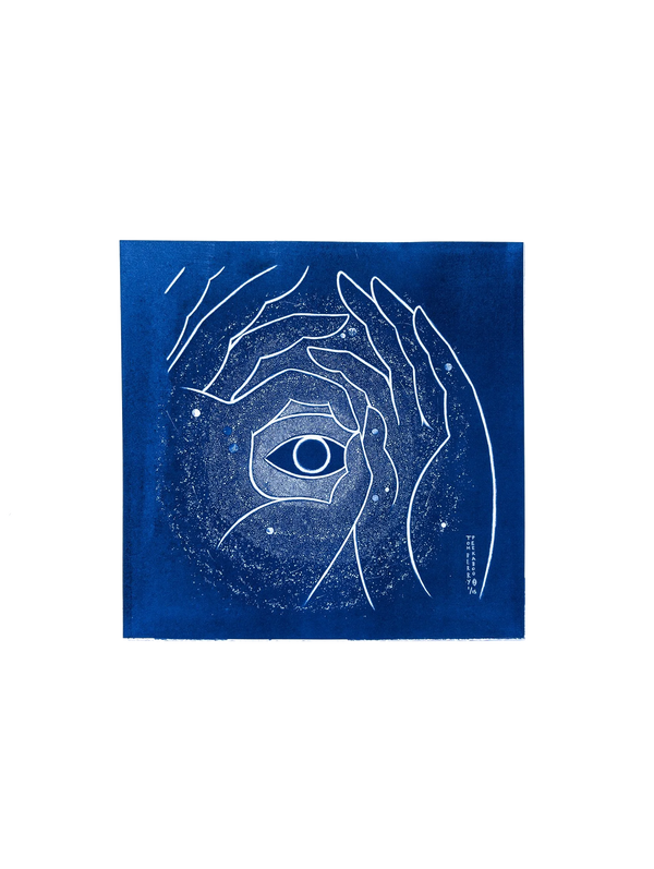 Handmade cyanotype artwork on deep blue background featuring white line drawings of multiple hands forming a circular frame around a single eye, with subtle speckled star-like patterns throughout.