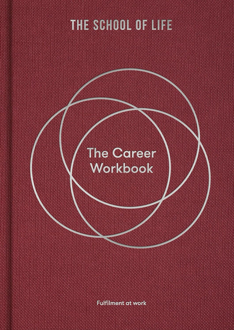 Burgundy book with white circle called The Career Workbook which is a guide to help with one's career , by The School of Life. Available at cuemars.com