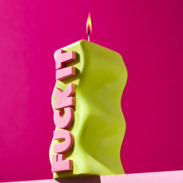 Green and pink Fuck It soy wax candle, by UK based independent brand Wavey Casa, available at www.cuemars.com