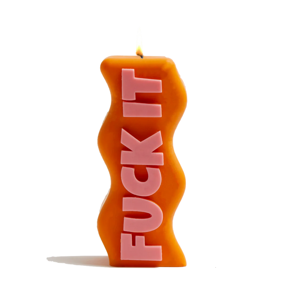 Orange and pink Fuck It soy wax candle, by UK based independent brand Wavey Casa, available at www.cuemars.com