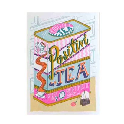 A can of tea that says Positivi-tea Optimistic Brew by Jacqueline Colley. Available at www.cuemars.com