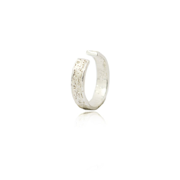 Sterling Silver Ear Cuff featuring the moon craters. Designed and handcrafted by independent maker Momocreatura