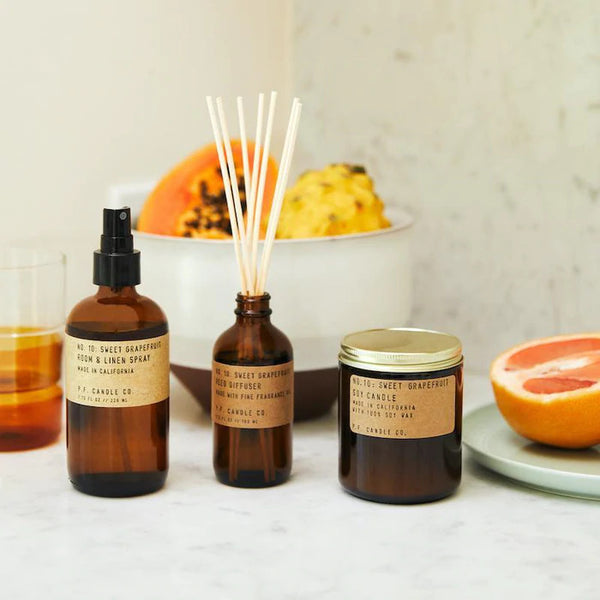 Amber Glass Bottle Linen Spray N10 Grapefruit by PF Candle Co. Available at www.cuemars.com